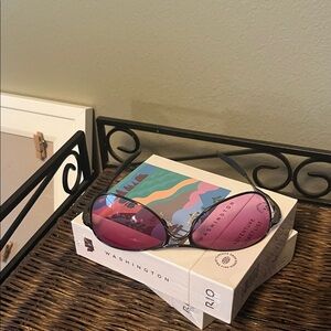 Oakley Rose colored lenses with dark metal frame Women's Glasses